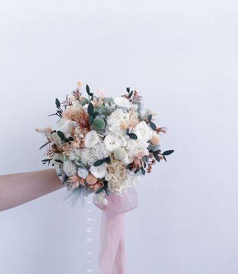 新娘手捧扭扭花有何寓意？扭扭花在婚礼中的意义是什么？